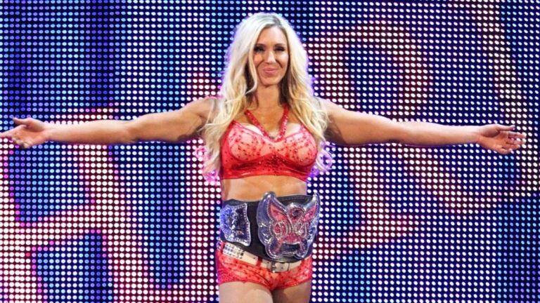 Charlotte Flair wearing the WWE Divas Championship