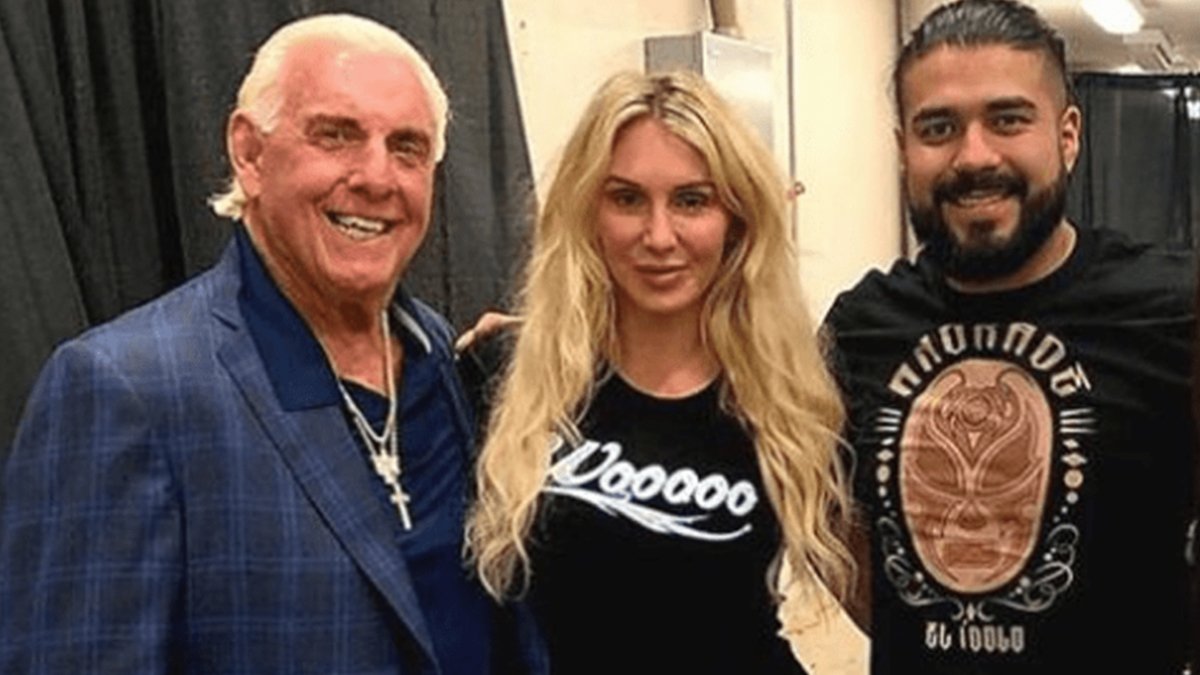 Andrade Suplexes Ric Flair Into A Pool (VIDEO)