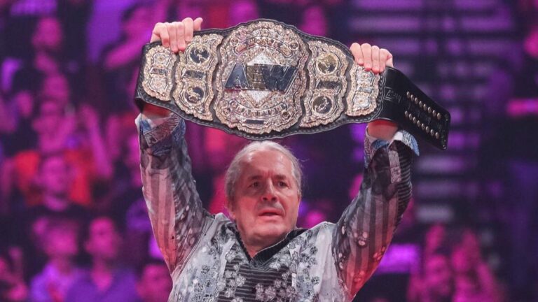 Bret Hart holding the AEW World Championship