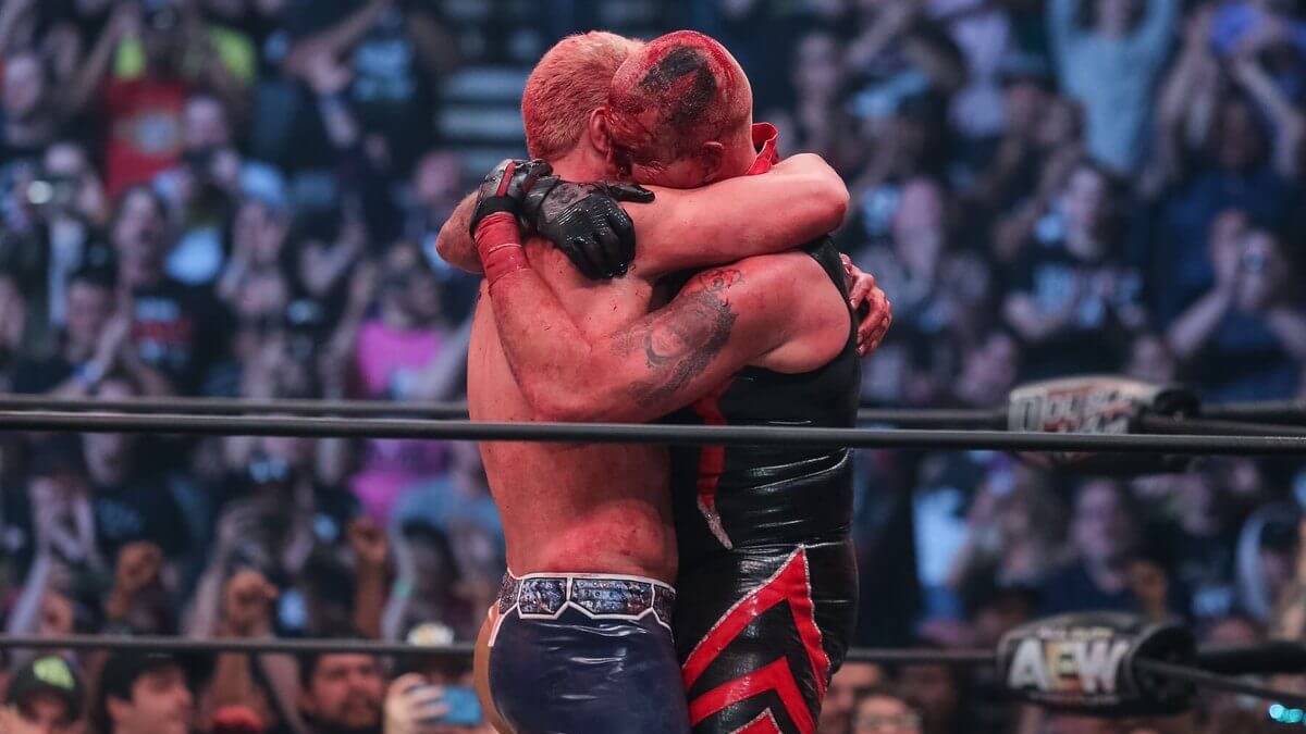 AEW's Dustin Rhodes hugging WWE's Cody Rhodes at Double or Nothing 2019