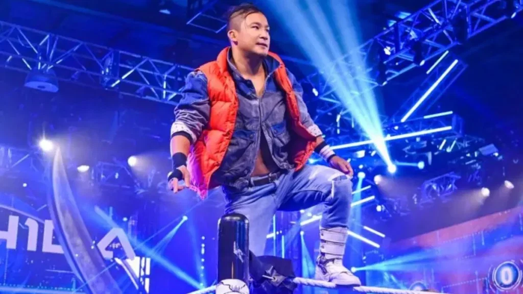 KUSHIDA standing on the top rope in WWE NXT