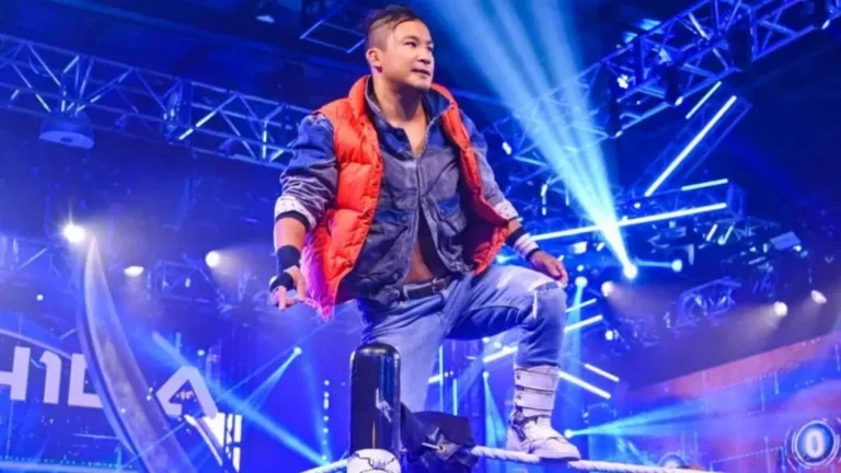 KUSHIDA standing on the top rope in WWE NXT