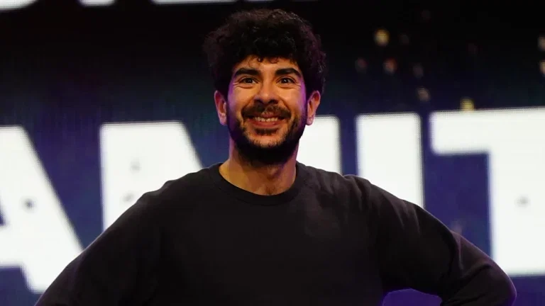 Tony Khan smiling.