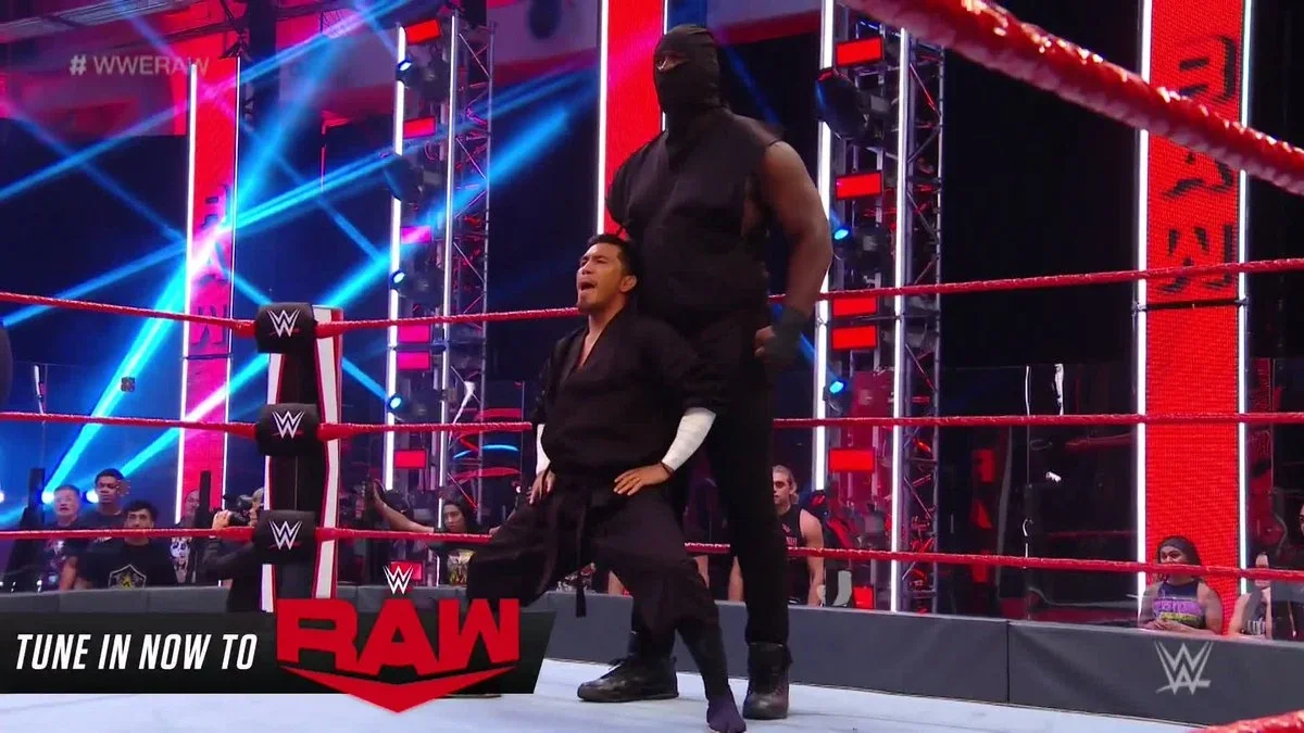 Omos, the then-unnamed 'Giant Ninja', stood tall behind Akira Tozawa on WWE Raw