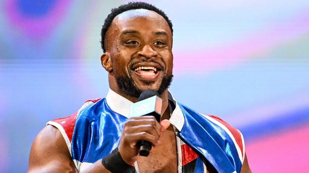 Big E smiling with microphone in hand
