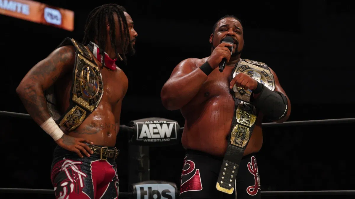 Swerve Strickland and Keith Lee getting emotional after their AEW Tag Title win