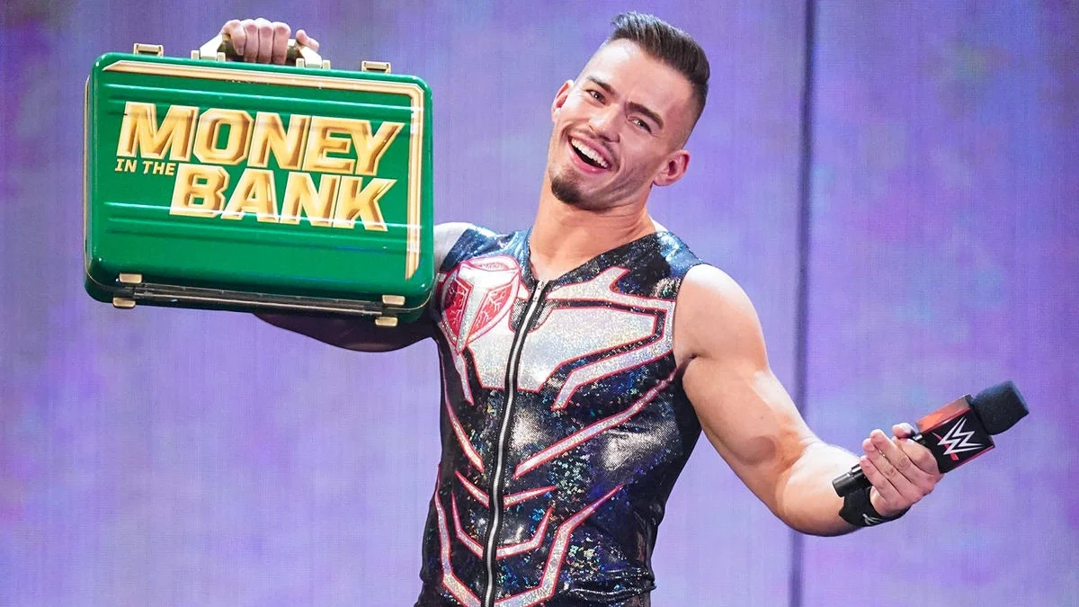 Theory flaunts his Money in the Bank briefcase