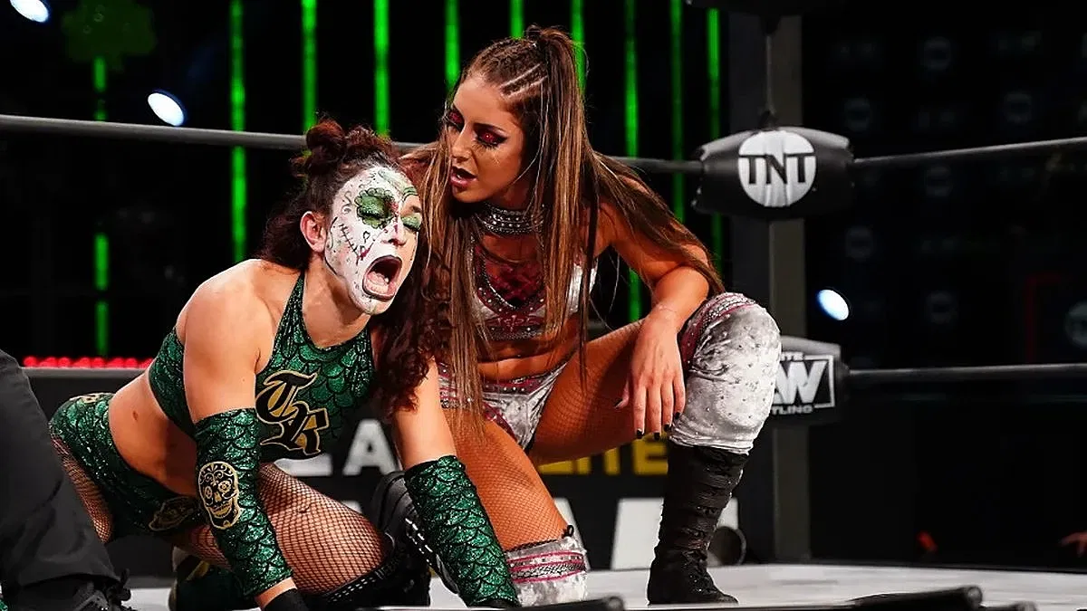 Britt Baker womanhandling Thunder Rosa