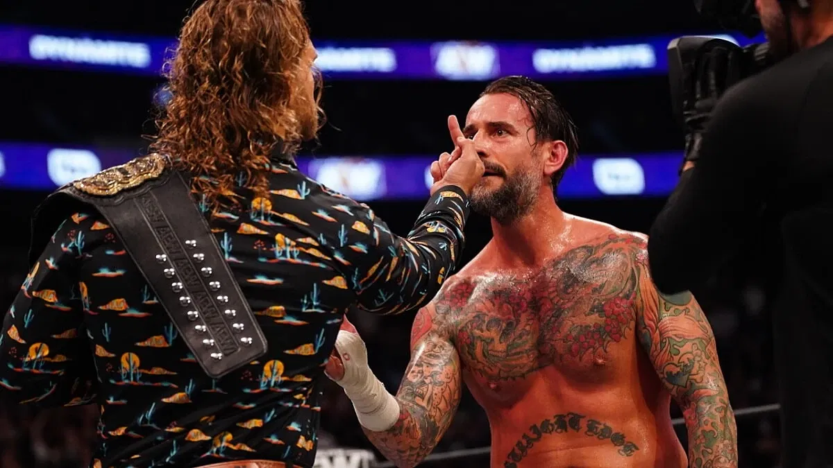 Hangman Page gives CM Punk the middle finger