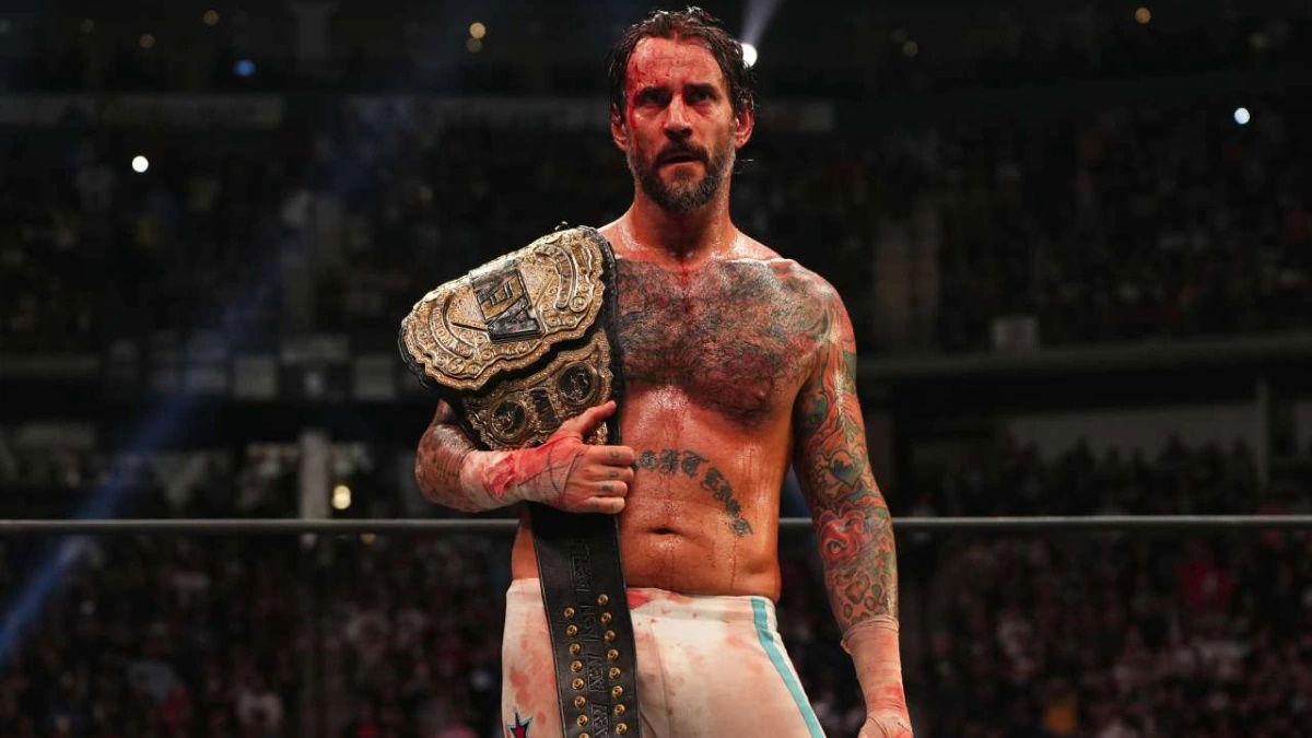 A bloody CM Punk in the ring at AEW All Out as the AEW World Champion