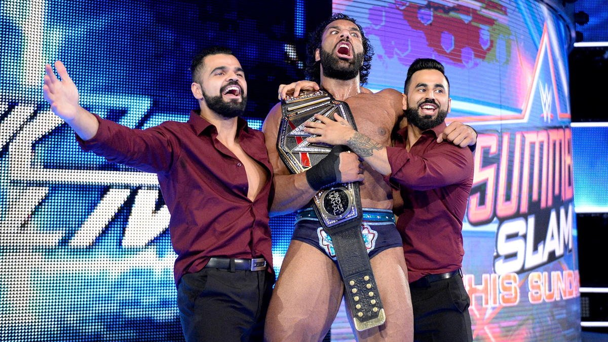 The The Bollywood Boyz (Singh Brothers) celebrating with WWE Champion Jinder Mahal