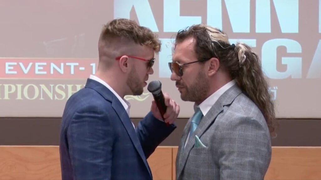 AEW's Will Ospreay and Kenny Omega at a press conference for NJPW Wrestle Kingdom 17.