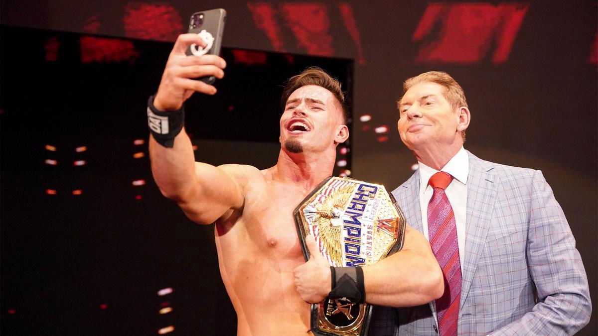 Austin Theory takes a selfie with Vince McMahon