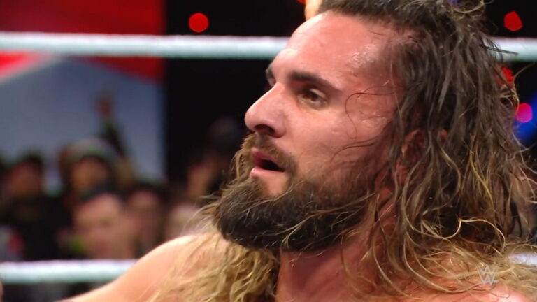 WWE star Seth Rollins worn out in the ring