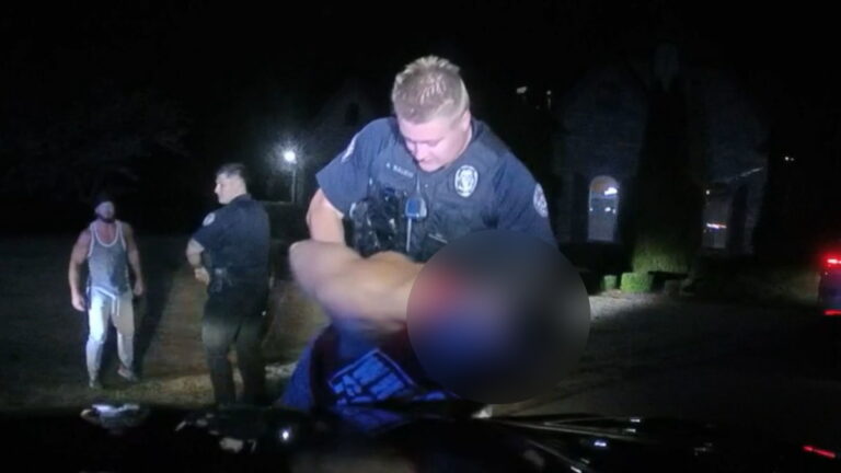 WWE SmackDown still of LA Knight being detained by police at AJ Styles' home on the show