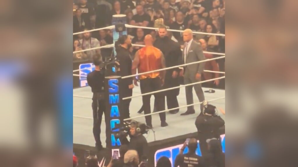 A screenshot of off-air footage featuring The Rock, Roman Reigns, Cody Rhodes and Seth Rollins after WWE SmackDown