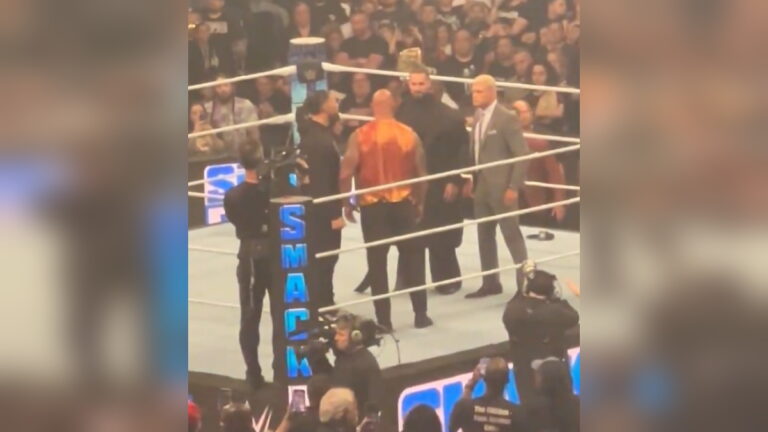 A screenshot of off-air footage featuring The Rock, Roman Reigns, Cody Rhodes and Seth Rollins after WWE SmackDown