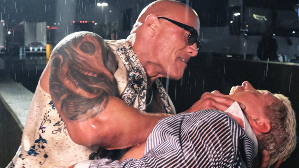 The Rock attacking Cody Rhodes on WWE Raw
