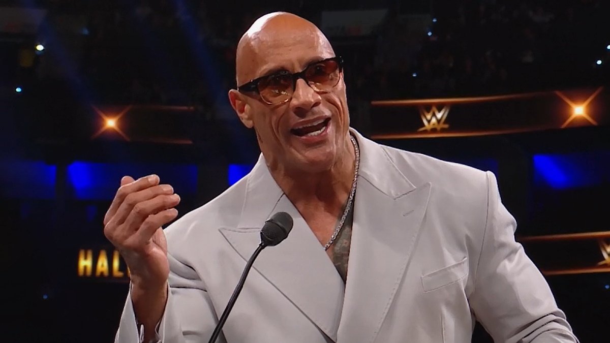 The Rock Receives New Championship Belt During WWE Hall Of Fame