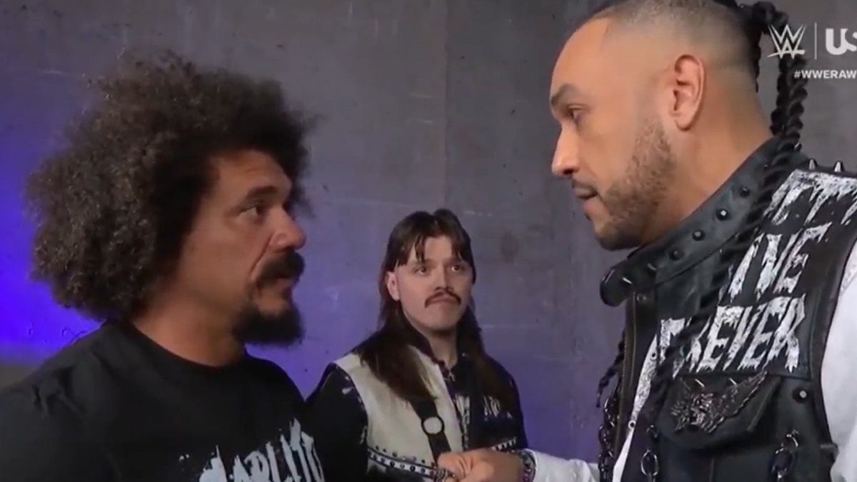 WWE stars Carlito and Damian Priest chatting backstage
