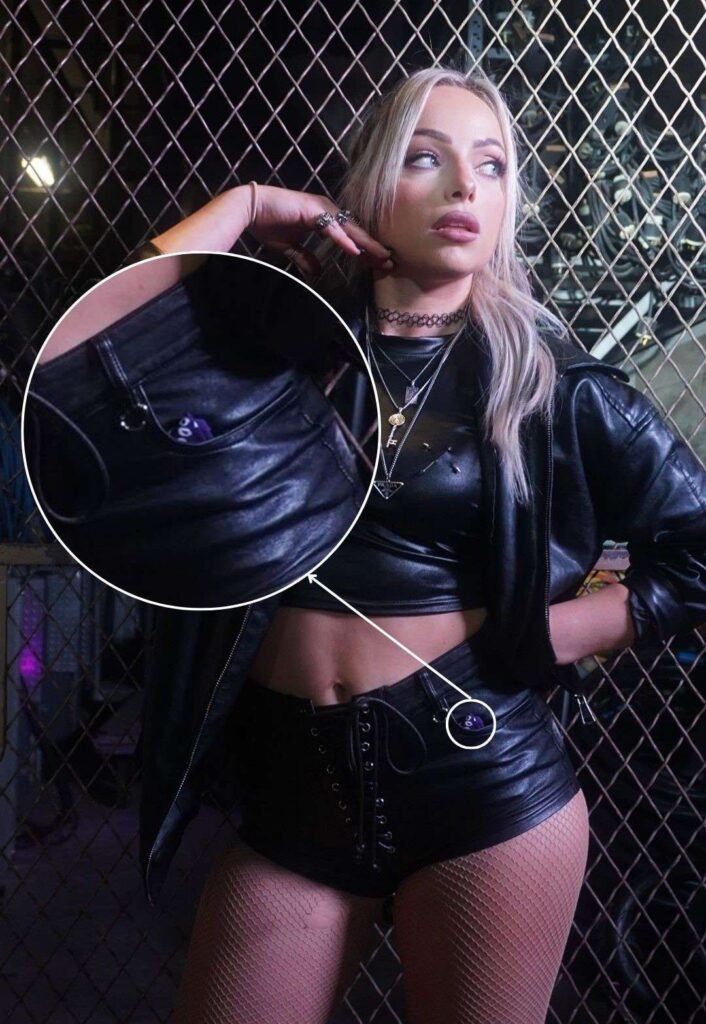 Liv Morgan with the purple Judgment Day bandanna in her pocket zoomed in