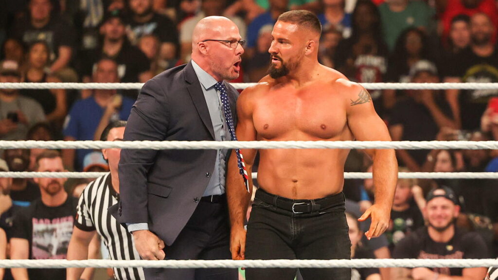 WWE Raw General Manager Adam Pearce with Bron Breakker