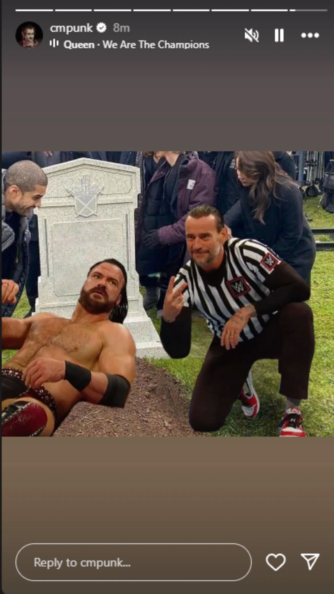 CM Punk Instagram story recreating meme of funeral with Drew McIntyre laying near a grave and CM Punk giving the peace sign