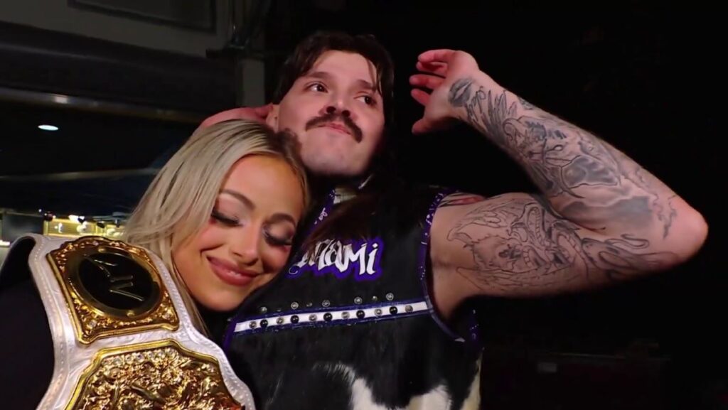 WWE's Liv Morgan hugging Dominik Mysterio