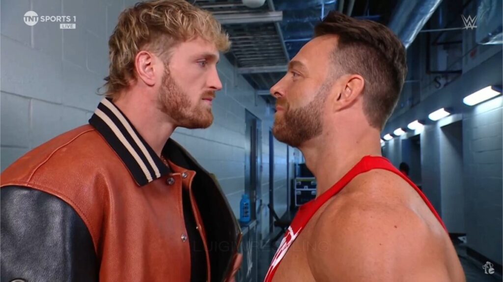WWE stars Logan Paul & LA Knight staring each other down