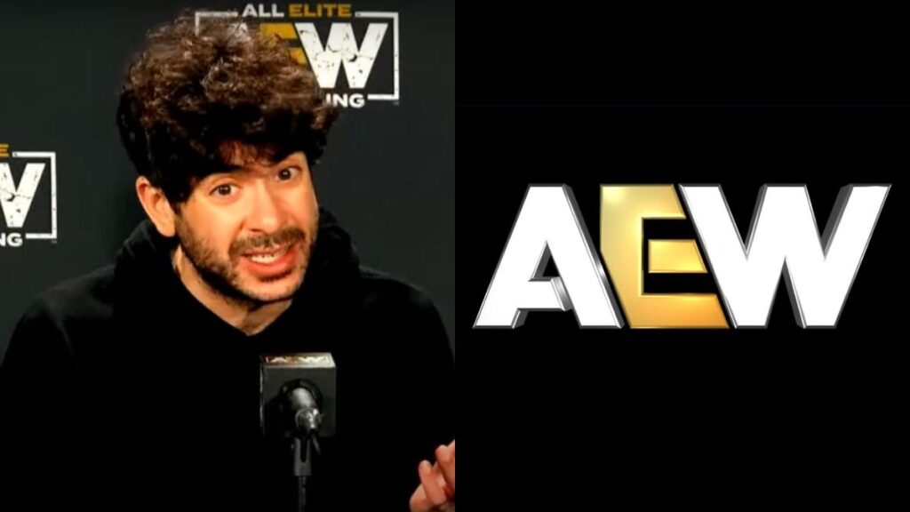 Tony Khan at the AEW Full Gear media scrum next to the AEW logo