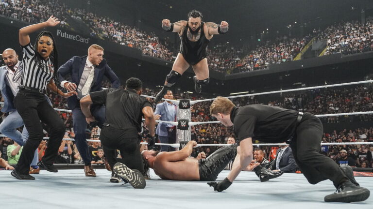 WWE's Bronson Reed hitting a Tsunami on Seth Rollins