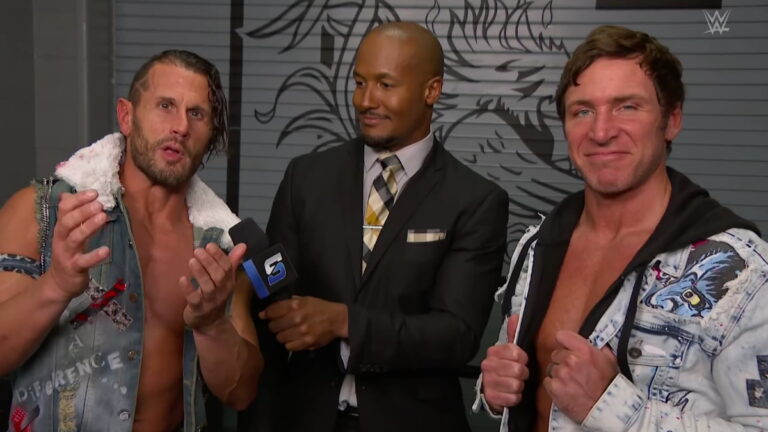 WWE photo after SmackDown of Motor City Machine Guns (Chris Sabin and Alex Shelley) being interviewed by Byron Saxton.