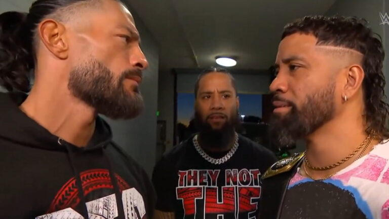 WWE SmackDown Roman Reigns face to face with Jey Uso with Jimmy Uso behind