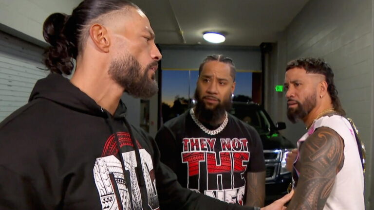 WWE SmackDown Roman Reigns face to face with Jey Uso with Jimmy Uso behind
