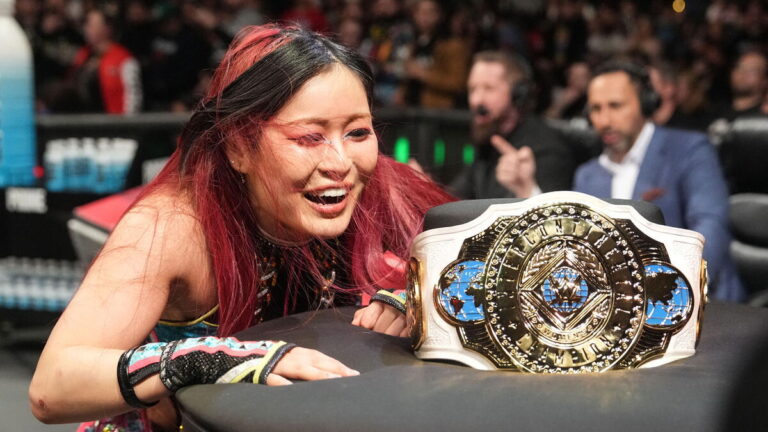IYO SKY with the WWE Women's Intercontinental Championship