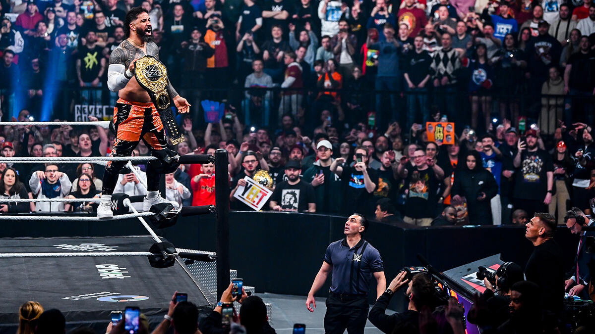 Jey Uso holding the WWE World heavyweight Championship on Raw