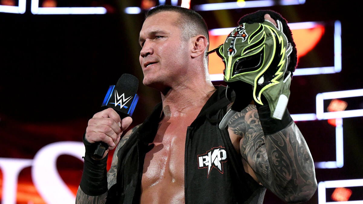 WWE star Randy Orton and Rey Mysterio mask
