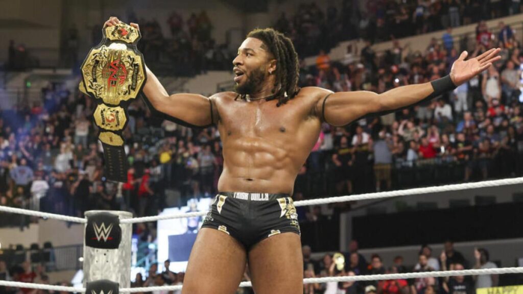 WWE NXT's Trick Williams holding the TNA World Championship