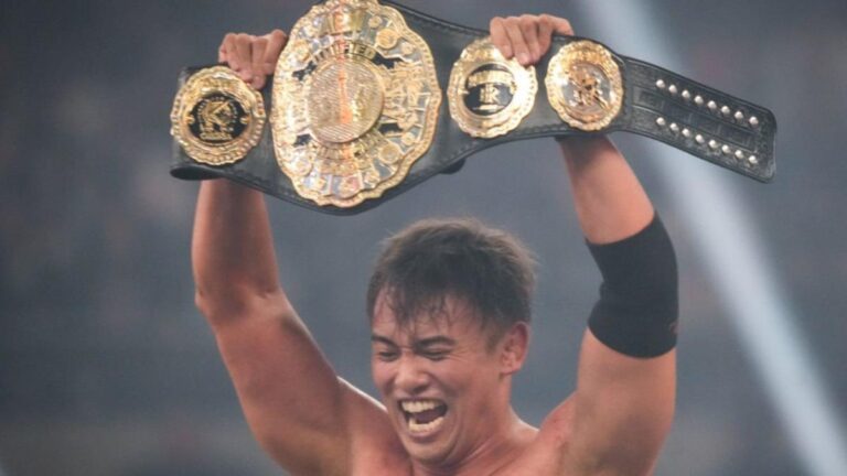 Kazuchika Okada holding the AEW Unified Championship