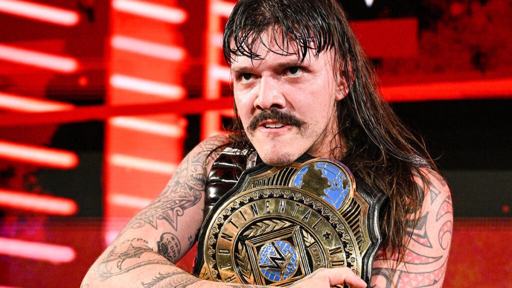Dominik Mysterio with the WWE Intercontinental Championship