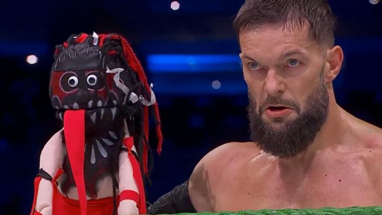 WWE's Finn Balor holding his Demonito puppet at AAA Triplemanía XXXIII