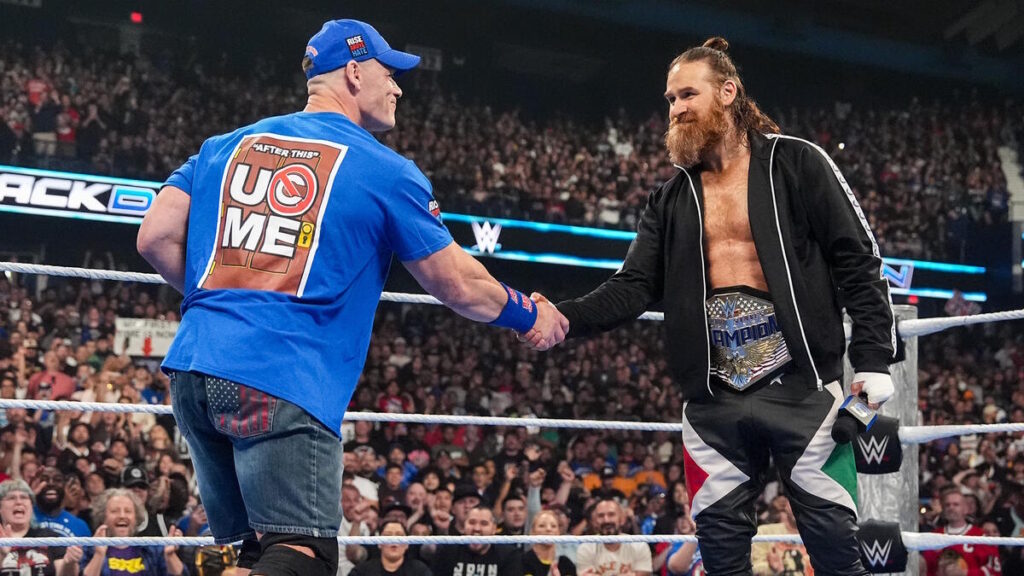 John Cena and Sami Zayn shaking hands before match on WWE SmackDown