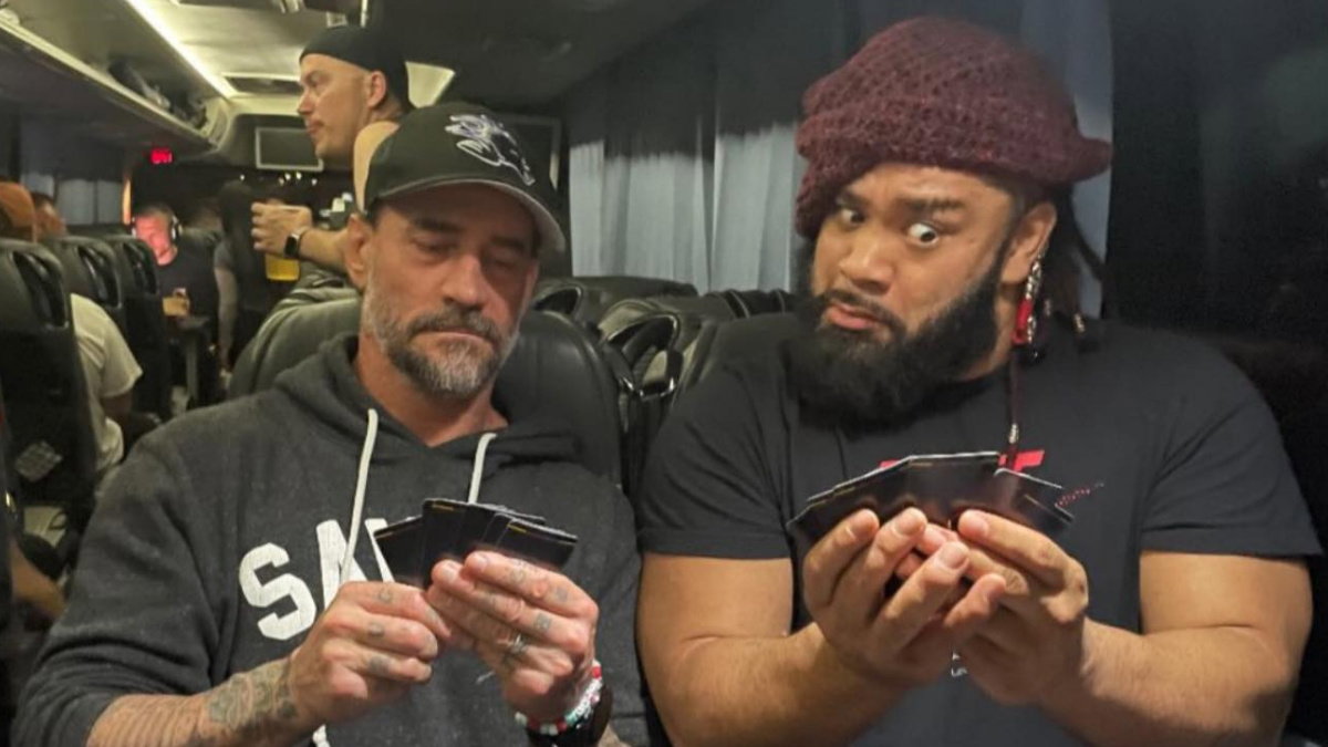 WWE's CM Punk and Jacob Fatu playing cards
