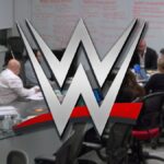 The WWE logo on top of the writer's room