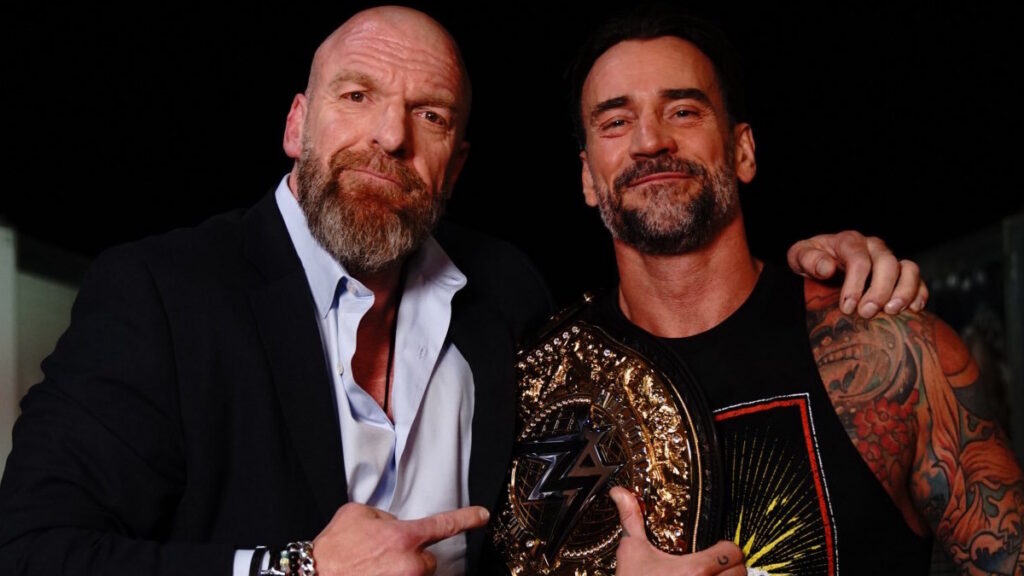 Triple H and WWE World Heavyweight Champion CM Punk