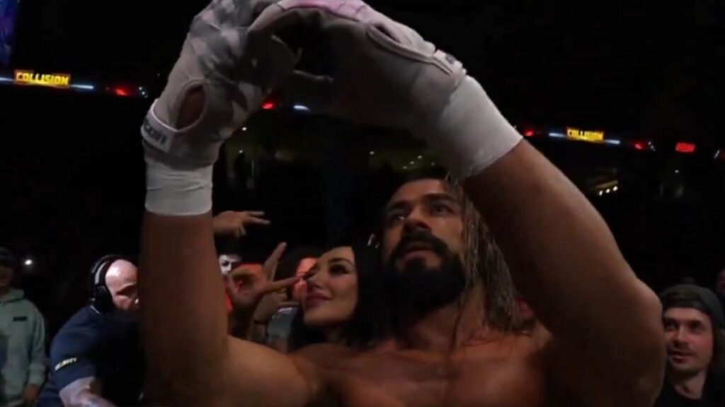 AEW's Andrade El Idolo taking a selfie with Sofia Sivan