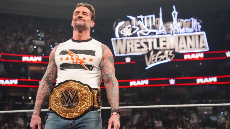 WWE World Heavyweight Champion CM Punk in front of the WrestleMania 42 sign