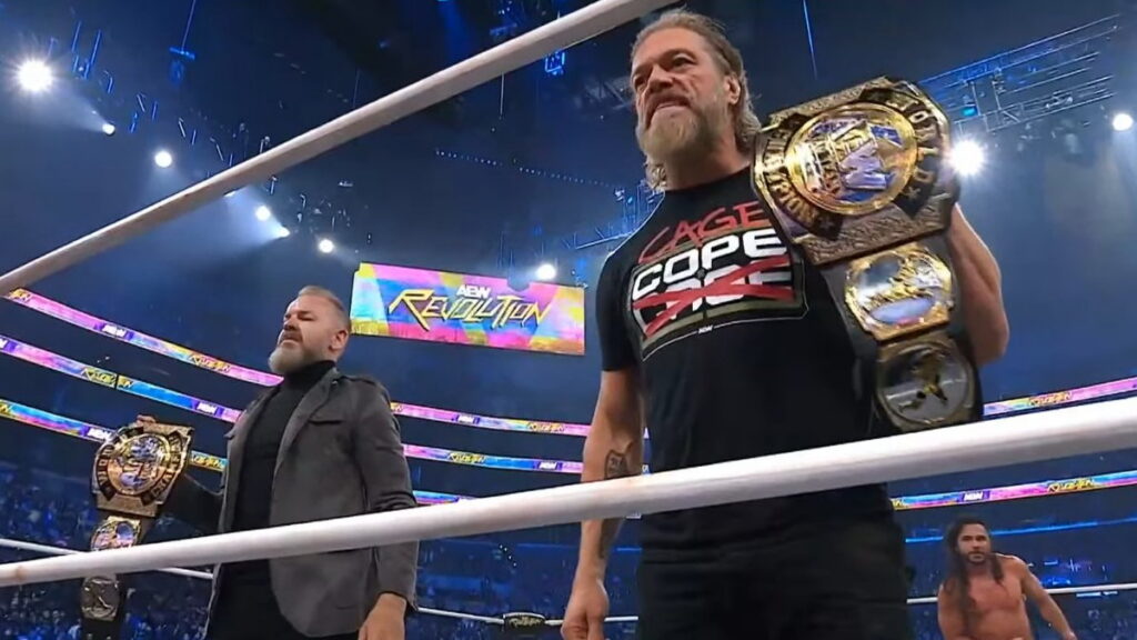 Adam Copeland and Christian Cage posing with the AEW World Tag Team Championship at Revolution 2026