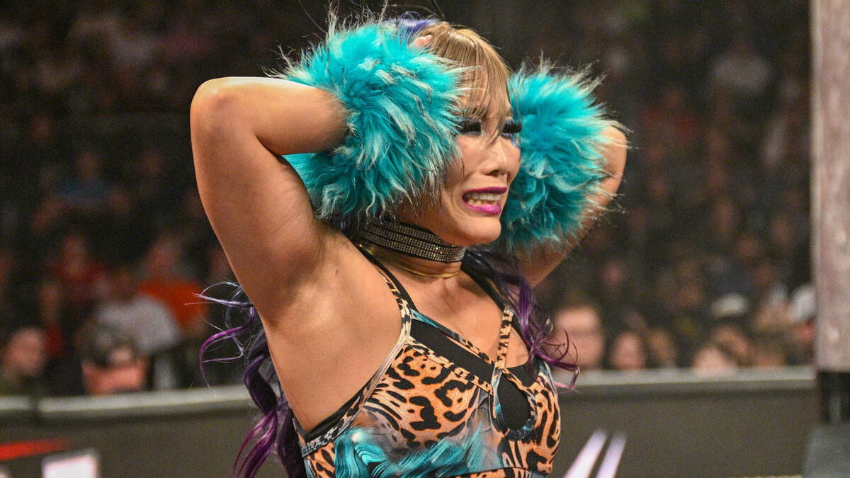 Kairi Sane covers her ears on WWE Raw