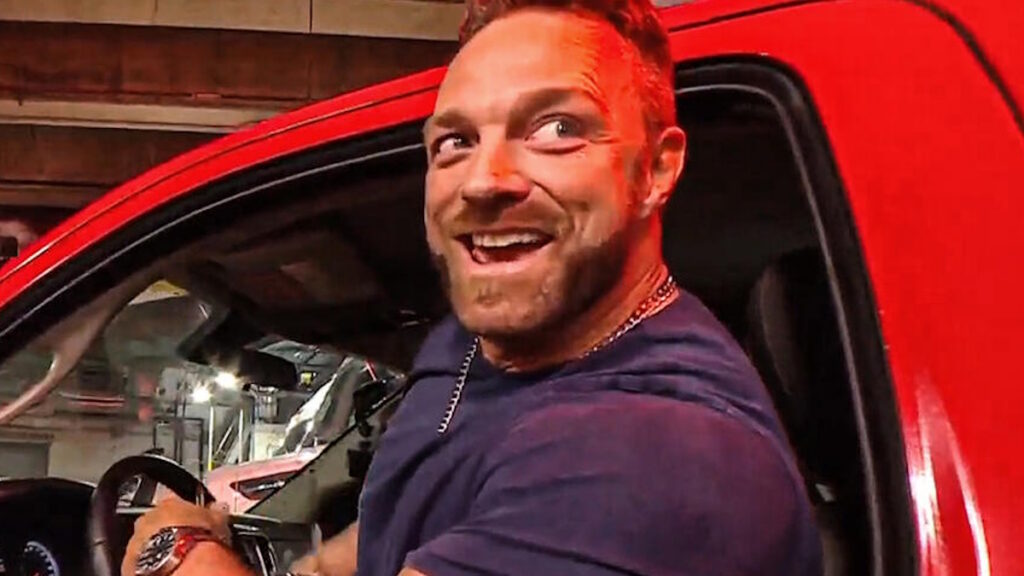 LA Knight driving an ambulance on WWE Raw